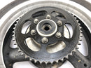 Suzuki GSX R 1100 GV73B [1990] - Takapyörän reuna takana jarrulevyllä ja ketjupyörällä-5