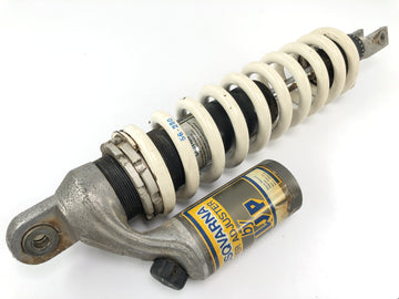 Husqvarna TE 610 8ae [1994] - Shokkivaimentimen sulka luupelaaja takana
