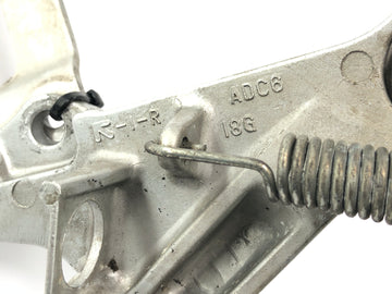 Suzuki GSX R 1000 WVBZ K3 [2003] - Jalkatukijärjestelmä kuljettajan oikean jalkatuen pidike jarrupolkimella - 0